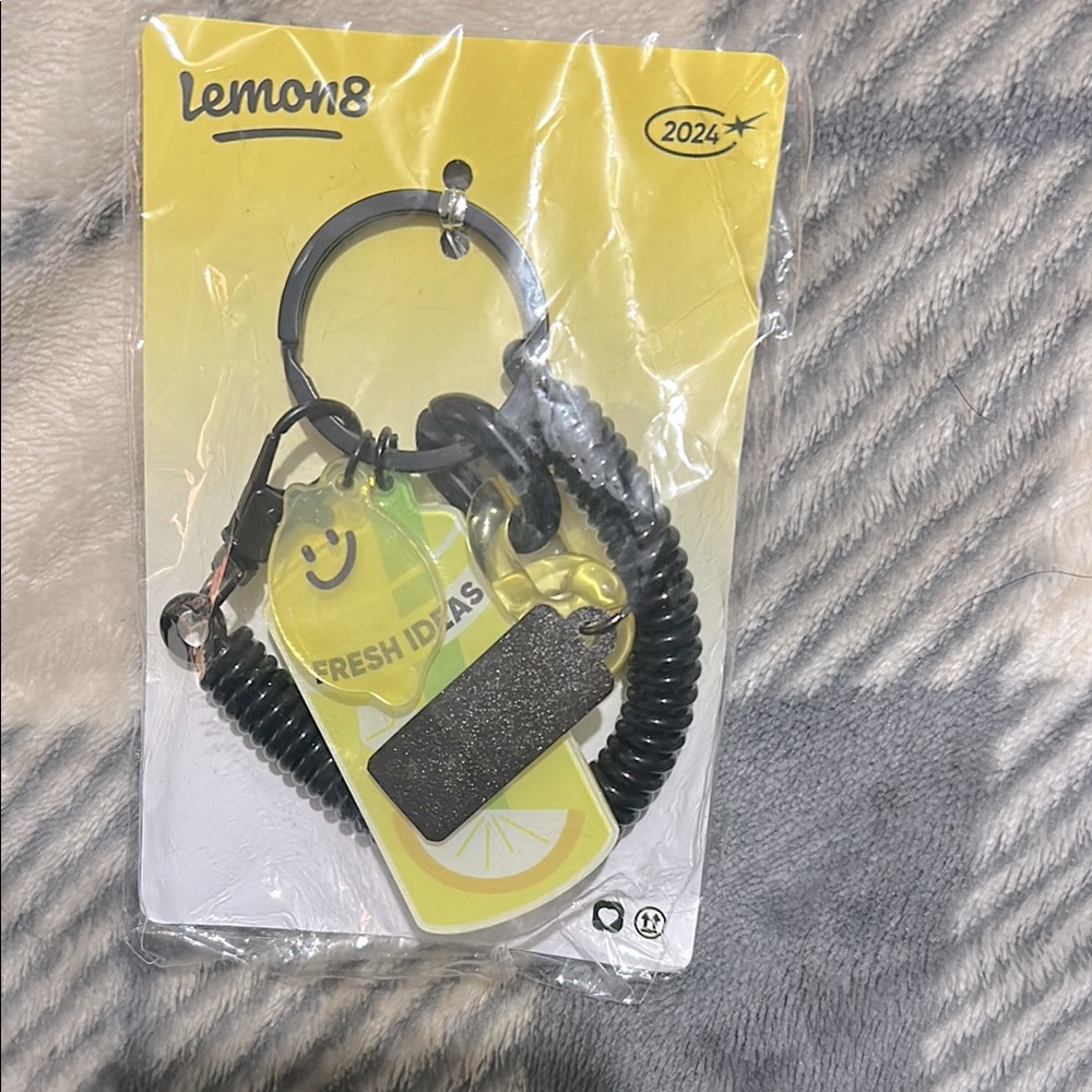 Lemon8 Black and Yellow Keychain Accessory
